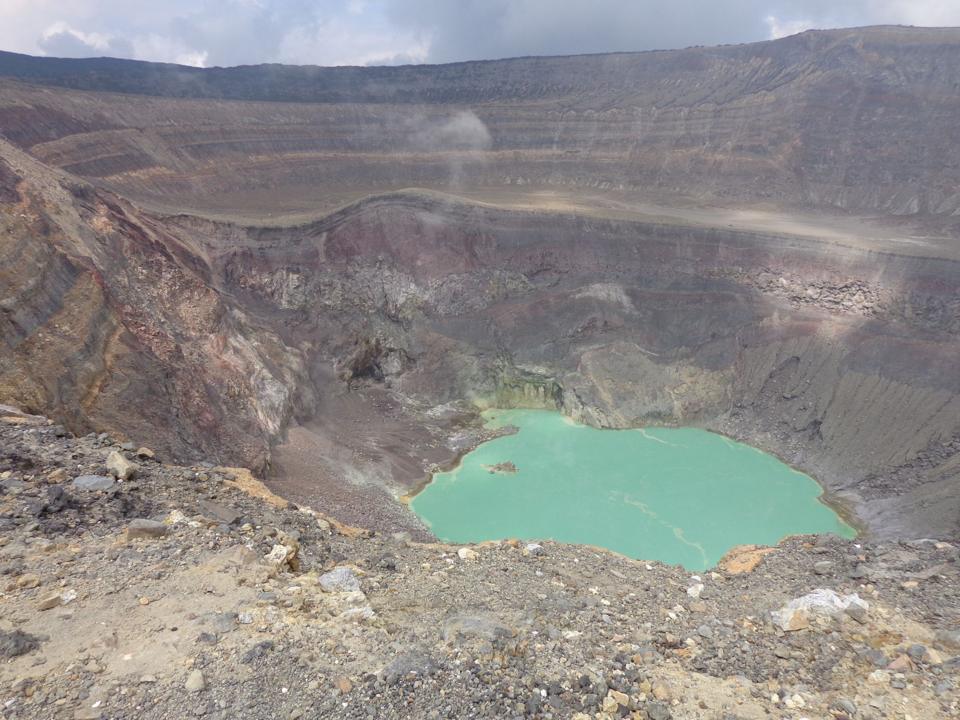 The turquoise crater lake inside Santa Ana volcano